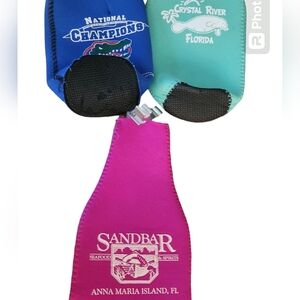 Set of 3 Koozies, keep your drinks cold, bottle opener too.